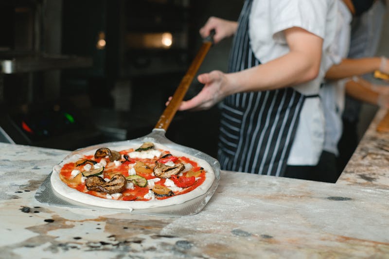 Pizza Ranch kitchen crafting authentic ranch pizza with fresh ingredients