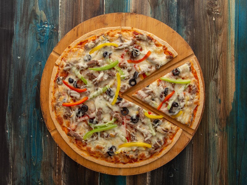 Four cheese pizza ranch style with herb crust