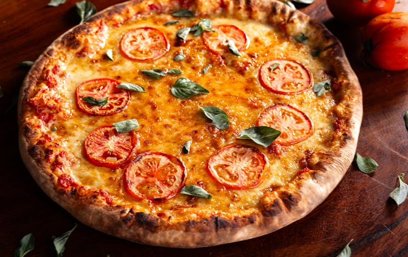 Ranch pizza with brisket and cowboy seasoning